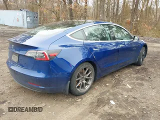 2020 Tesla Model 3 Standard Range Plus with VIN 5YJ3E1EA1LF658521, listed as a IAAI auction lot 41804722 with 83,248 mi miles and . Bid and sale history available at DreamBid. Image 4.