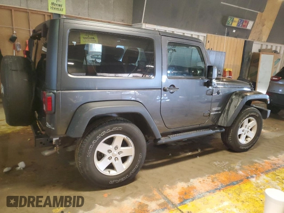 2017 Jeep Wrangler Willys Wheeler with VIN 1C4AJWAG3HL751703, listed as a Copart auction lot 88861635 with 14,114 mi miles and Salvage Title. Bid and sale history available at DreamBid. Image 3.