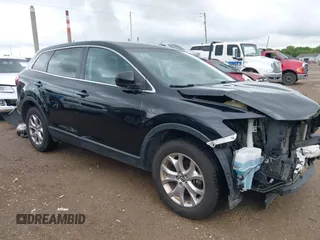 2015 Mazda CX-9 Sport with VIN JM3TB3BV1F0466070, listed as a IAAI auction lot 42350686 with 110,818 mi miles and . Bid and sale history available at DreamBid. Image 1.