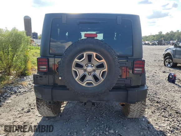 2010 Jeep Wrangler Rubicon with VIN 1J4BA6D10AL109001, listed as a Copart auction lot 69453954 with 137,821 mi miles and Salvage title. Bid and sale history available at DreamBid. Image 6.