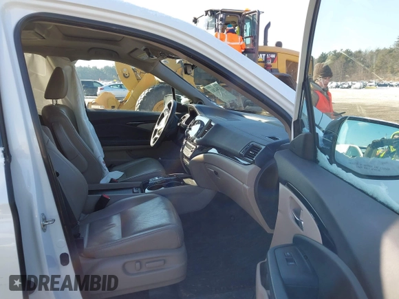 2020 Honda Pilot Elite with VIN 5FNYF6H09LB039247, listed as a IAAI auction lot 41364383 with 56,865 mi miles and . Bid and sale history available at DreamBid. Image 5.