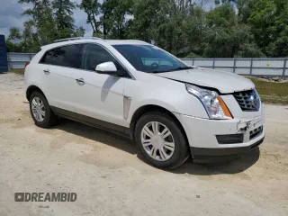2014 Cadillac SRX Luxury Collection z VIN 3GYFNBE30ES685072, wystawiony jako Copart lot #58122705 z przebiegiem 128 013 mil mil oraz Szkoda całkowita • Salvage title. Historia ofert i sprzedaży dostępna na DreamBid. Obrazek 4.