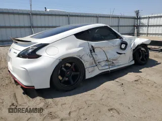 2015 Nissan 370Z Nismo z VIN JN1AZ4EH3FM441254, wystawiony jako Copart lot #52646145 z przebiegiem 74 303 mil mil oraz Szkoda całkowita • Salvage title. Historia ofert i sprzedaży dostępna na DreamBid. Obrazek 3.