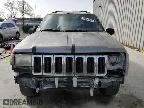 1998 Jeep Grand Cherokee Laredo with VIN 1J4FX58S1WC130492, listed as a Copart auction lot 47656265 with 0 mi miles and Salvage Title. Bid and sale history available at carsss.com. Image 5.