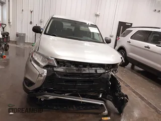2020 Mitsubishi Outlander ES z VIN JA4AZ3A38LZ018227, wystawiony jako IAAI lot #42142244 z przebiegiem 91 342 mil mil oraz . Historia ofert i sprzedaży dostępna na DreamBid. Obrazek 13.
