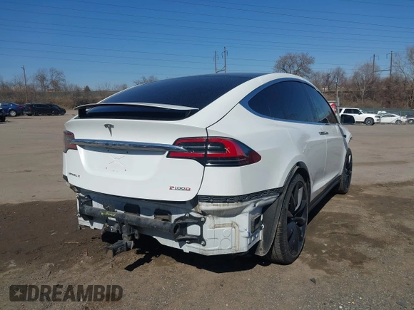 2018 Tesla Model X 75D with VIN 5YJXCAE45JF103828, listed as a IAAI auction lot 41698708 with 118,699 mi miles and . Bid and sale history available at carsss.com. Image 18.