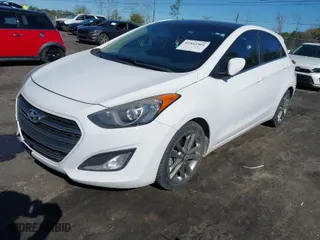 2016 Hyundai Elantra GT with VIN KMHD35LH3GU315350, listed as a IAAI auction lot 41813901 with 156,684 mi miles. Bid and sale history available at carsss.com. Image 2.