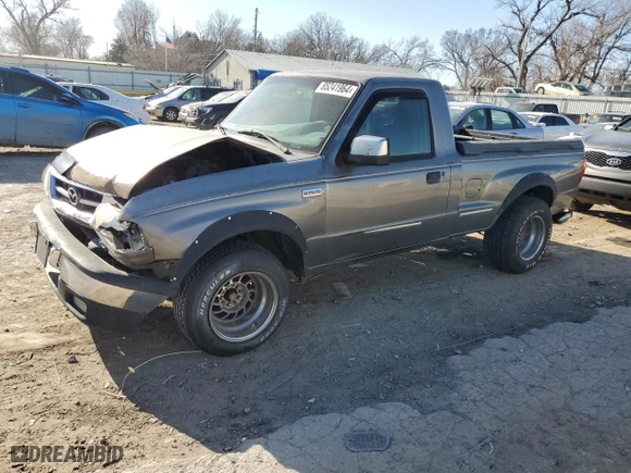 1999 Mazda B-Series 2WD Truck SX with VIN 4F4YR12C5XTM24067, listed as a Copart auction lot 85241964 with 219,030 mi miles and Salvage Title. Bid and sale history available at carsss.com. Image 1.