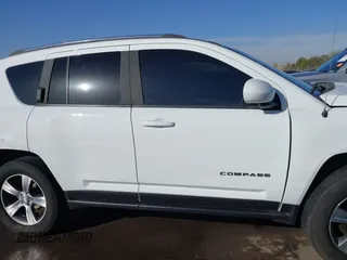 2016 Jeep Compass High Altitude Edition with VIN 1C4NJDEB8GD546245, listed as a IAAI auction lot 41557037 with 116,672 mi miles. Bid and sale history available at carsss.com. Image 14.