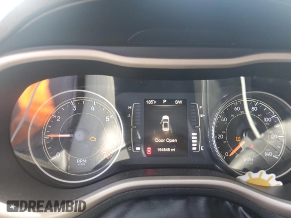 2015 Jeep Cherokee Sport with VIN 1C4PJLAB9FW720187, listed as a Copart auction lot 53091225 with 154,545 mi miles and Salvage Title. Bid and sale history available at carsss.com. Image 9.