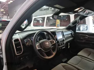 2023 Ram 1500 Big Horn with VIN 1C6RRFFG7PN518566, listed as a IAAI auction lot 42623818 with 172 mi miles and . Bid and sale history available at DreamBid. Image 6.