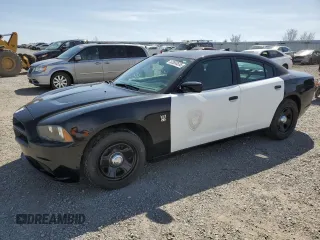 2014 Dodge Charger Police with VIN 2C3CDXAG0EH357871, listed as a Copart auction lot 52650555 with 143,334 mi miles and Salvage Title. Bid and sale history available at DreamBid. Image 1.