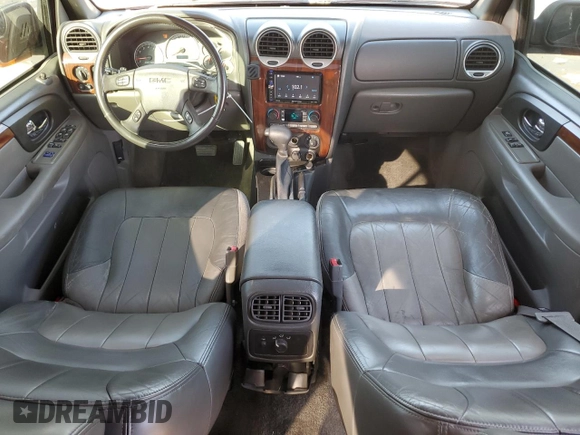 2003 GMC Envoy SLT with VIN 1GKDT13S732378731, listed as a Copart auction lot 88340825 with 125,814 mi miles and Salvage Title. Bid and sale history available at carsss.com. Image 8.