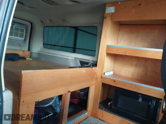 2007 Ford Econoline Passenger XL with VIN 1FBNE31L57DB42403, listed as a IAAI auction lot 41997050 with 217,651 mi miles and . Bid and sale history available at carsss.com. Image 8.