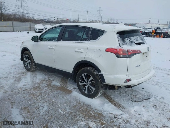 2018 Toyota RAV4 XLE with VIN 2T3RFREV1JW792915, listed as a IAAI auction lot 41607455 with 67,840 mi miles. Bid and sale history available at carsss.com. Image 3.