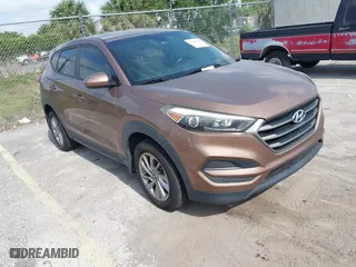 2016 Hyundai Tucson SE with VIN KM8J23A4XGU180300, listed as a IAAI auction lot 42123067 with 123,804 mi miles. Bid and sale history available at carsss.com. Image 1.