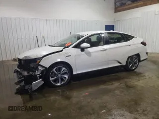 2021 Honda Clarity with VIN JHMZC5F11MC000233, listed as a Copart auction lot 49309203 with Not Provided miles and . Bid and sale history available at DreamBid. Image 1.