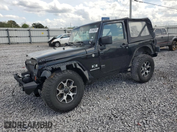 2009 Jeep Wrangler X z VIN 1J4FA24169L706787, wystawiony jako Copart lot #51540265 z przebiegiem 126 934 mil mil oraz Szkoda całkowita • Salvage title. Historia ofert i sprzedaży dostępna na DreamBid. Obrazek 1.