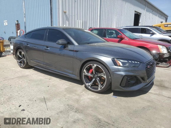 2023 Audi RS 5 Sportback z VIN WUAAWCF55PA902979, wystawiony jako Copart lot #54194715 z przebiegiem 9 576 mil mil oraz Szkoda całkowita • Salvage title. Historia ofert i sprzedaży dostępna na DreamBid. Obrazek 4.