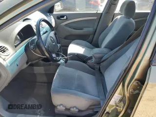2005 Suzuki Forenza z VIN KL5JJ86Z25K095152, wystawiony jako Copart lot #69513534 z przebiegiem 40 534 mil mil oraz Szkody całkowita. Historia ofert i sprzedaży dostępna na DreamBid. Obrazek 7.