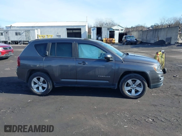 2017 Jeep Compass High Altitude with VIN 1C4NJDEB1HD111889, listed as a IAAI auction lot 41509294 with 104,038 mi miles. Bid and sale history available at carsss.com. Image 13.