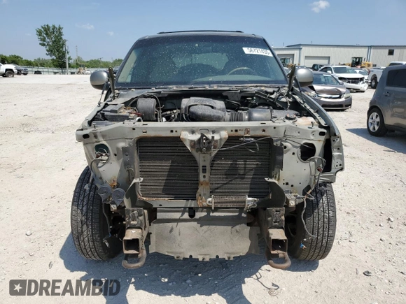 1999 Ford Expedition XLT z VIN 1FMPU18L0XLC03675, wystawiony jako Copart lot #56721435 z przebiegiem 111 652 mil mil oraz Szkoda całkowita • Salvage title. Historia ofert i sprzedaży dostępna na DreamBid. Obrazek 5.