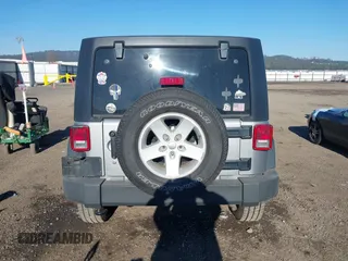 2018 Jeep Wrangler JK Unlimited Sport S with VIN 1C4BJWDG5JL926703, listed as a IAAI auction lot 41382629 with 66,567 mi miles. Bid and sale history available at carsss.com. Image 17.