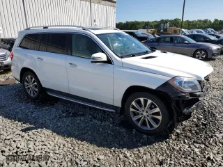 2016 Mercedes-Benz GL with VIN 4JGDF6EE3GA690348, listed as a Copart auction lot 60999894 with 143,623 mi miles and Salvage Title. Bid and sale history available at carsss.com. Image 4.