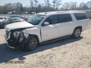 2015 GMC Yukon XL SLT with VIN 1GKS1HKC2FR118409, listed as a Copart auction lot 49601445 with 115,970 mi miles and Salvage Title. Bid and sale history available at carsss.com. Image 1.