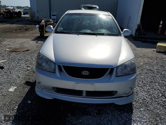 2005 Kia Spectra with VIN KNAFE162155081155, listed as a Copart auction lot 53893255 with 127,937 mi miles and Salvage Title. Bid and sale history available at carsss.com. Image 5.
