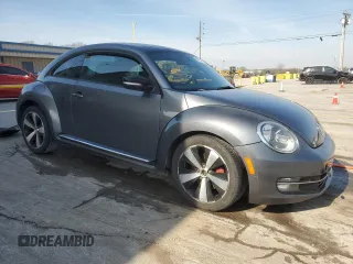 2012 Volkswagen Beetle with VIN 3VWV87AT3CM609968, listed as a Copart auction lot 50916325 with 148,004 mi miles and Salvage Title. Bid and sale history available at DreamBid. Image 4.