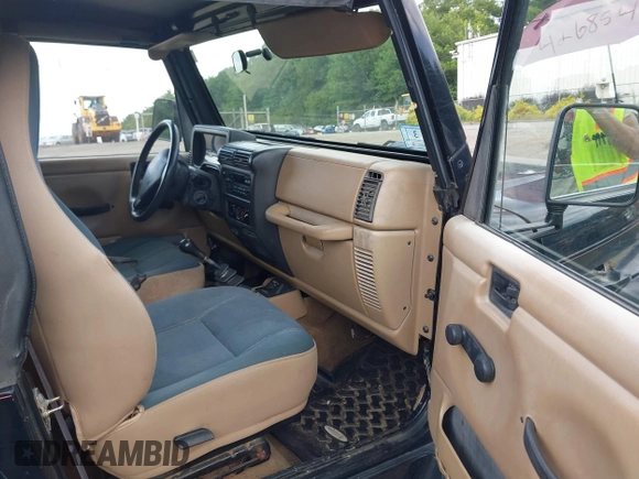 2001 Jeep Wrangler Sahara with VIN 1J4FA59S41P358035, listed as a IAAI auction lot 42685488 with 120,630 mi miles and . Bid and sale history available at DreamBid. Image 5.