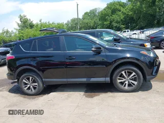 2018 Toyota RAV4 XLE with VIN 2T3WFREV3JW468450, listed as a IAAI auction lot 42528560 with 77,513 mi miles and . Bid and sale history available at DreamBid. Image 13.