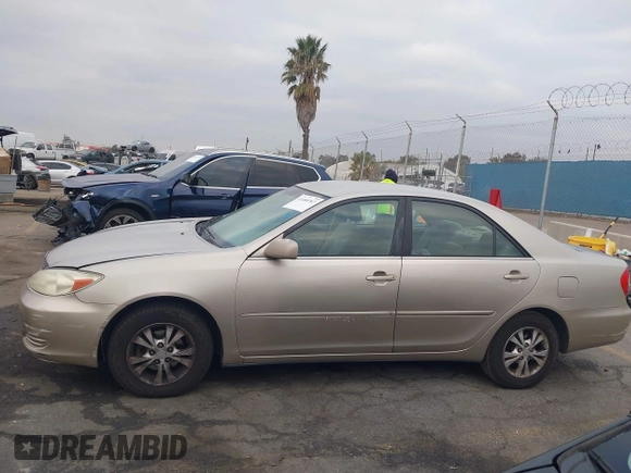 2004 Toyota Camry LE with VIN 4T1BF32K44U069081, listed as a IAAI auction lot 41460767 with 204,992 mi miles and . Bid and sale history available at carsss.com. Image 14.