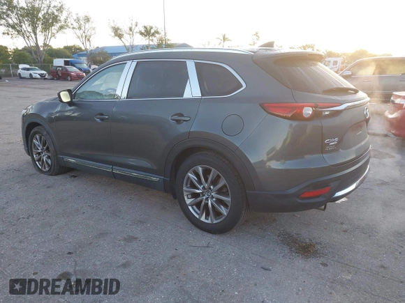 2019 Mazda CX-9 Signature with VIN JM3TCBEY5K0331147, listed as a IAAI auction lot 42026101 with 64,499 mi miles and . Bid and sale history available at DreamBid. Image 3.