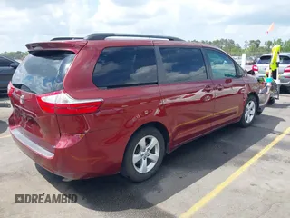2015 Toyota Sienna LE AAS with VIN 5TDKK3DC7FS685452, listed as a IAAI auction lot 41942789 with 194,163 mi miles. Bid and sale history available at carsss.com. Image 4.