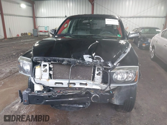 2006 Dodge Dakota ST with VIN 1D7HE28N66S707560, listed as a IAAI auction lot 41982933 with 150,775 mi miles and . Bid and sale history available at carsss.com. Image 6.