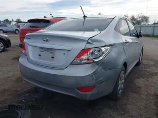 2013 Hyundai Accent GLS with VIN KMHCT4AE6DU481193, listed as a IAAI auction lot 41652387 with 148,420 mi miles. Bid and sale history available at carsss.com. Image 4.