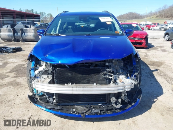 2021 Chrysler Pacifica Touring with VIN 2C4RC1FG5MR511546, listed as a IAAI auction lot 41882085 with 85,635 mi miles and . Bid and sale history available at DreamBid. Image 13.