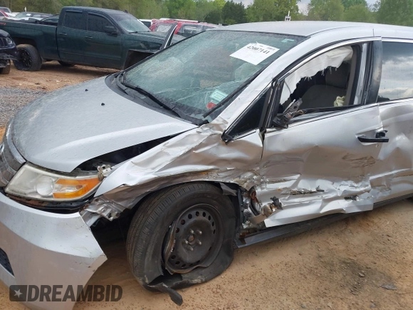 2013 Honda Odyssey LX with VIN 5FNRL5H27DB075559, listed as a IAAI auction lot 42007141 with Not Provided miles and . Bid and sale history available at carsss.com. Image 6.