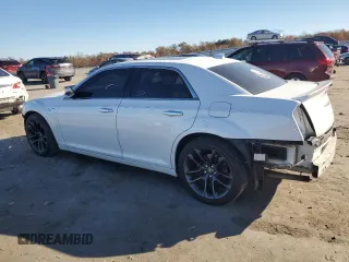2015 Chrysler 300 C with VIN 2C3CCAET9FH922210, listed as a Copart auction lot 80310864 with 118,931 mi miles and Salvage Title. Bid and sale history available at DreamBid. Image 2.