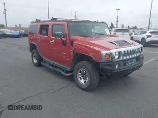 2004 Hummer H2 with VIN 5GRGN23U24H104618, listed as a IAAI auction lot 41972937 with 106,181 mi miles. Bid and sale history available at carsss.com. Image 1.