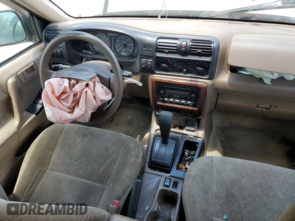 2001 Isuzu Rodeo S with VIN 4S2CK58W514313783, listed as a Copart auction lot 63038984 with 179,628 mi miles and Clean Title. Bid and sale history available at DreamBid. Image 8.