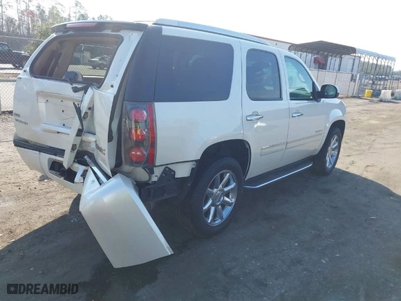 2012 GMC Yukon Denali with VIN 1GKS1EEF5CR156426, listed as a IAAI auction lot 41673781 with 147,022 mi miles. Bid and sale history available at carsss.com. Image 4.