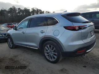 2021 Mazda CX-9 Grand Touring z VIN JM3TCBDY4M0515130, wystawiony jako Copart lot #43917385 z przebiegiem 103 330 mil mil oraz Szkoda całkowita • Salvage title. Historia ofert i sprzedaży dostępna na DreamBid. Obrazek 2.