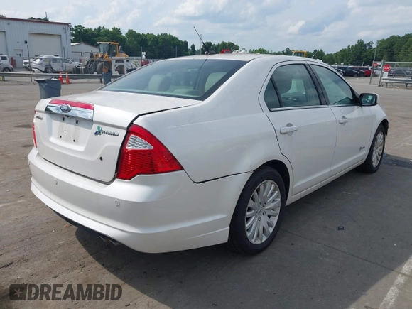 2012 Ford Fusion Hybrid с VIN 3FADP0L39CR216555, выставлен на аукционе IAAI как лот 42506669 с пробегом 171 346 миль миль и . История ставок и продаж доступна на DreamBid. Изображение 4.