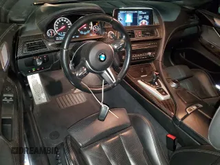 2017 BMW M6 z VIN WBS6J9C56HD934812, wystawiony jako Copart lot #44018915 z przebiegiem 84 409 mil mil oraz Szkoda całkowita • Salvage title. Historia ofert i sprzedaży dostępna na DreamBid. Obrazek 8.