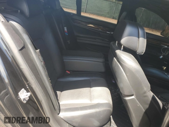 2014 BMW 7 Series 750i xDrive with VIN WBAYB6C52ED224536, listed as a Copart auction lot 54397595 with 107,410 mi miles and Salvage title. Bid and sale history available at DreamBid. Image 10.