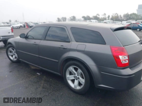 2005 Dodge Magnum RT with VIN 2D4GV58265H500284, listed as a IAAI auction lot 41194672 with 104,894 mi miles. Bid and sale history available at carsss.com. Image 14.