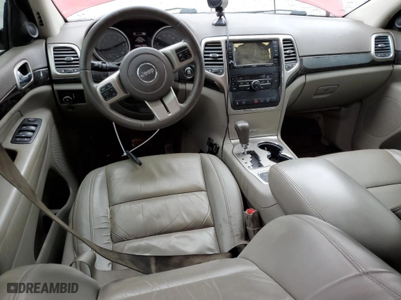 2011 Jeep Grand Cherokee Laredo with VIN 1J4RR4GT1BC542031, listed as a Copart auction lot 42792985 with 221,000 mi miles and Salvage Title. Bid and sale history available at carsss.com. Image 8.